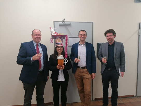 Picture of Qianqian Yan together with the examiner after his PhD defense