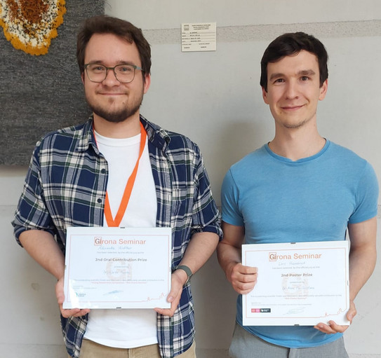 Picture of Alexandre Walther and Lars Hebenbrock with their prices from the Girona Seminar 2024.