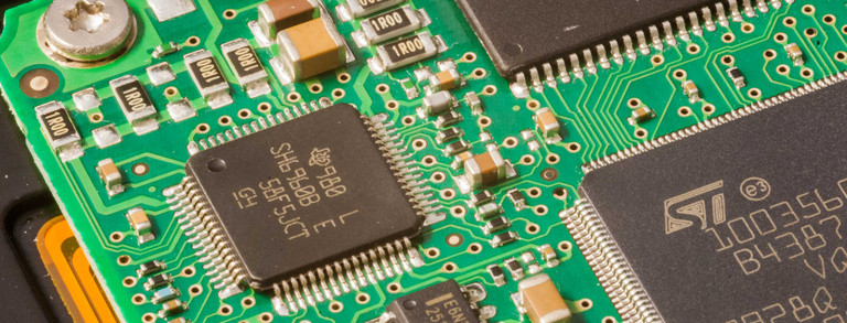 Close-up of computer board A close-up of a computer board in green.